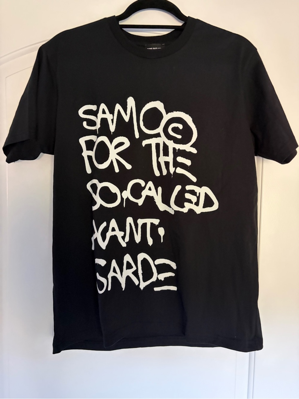 AMO Black Tee with Bold White Graffiti Script